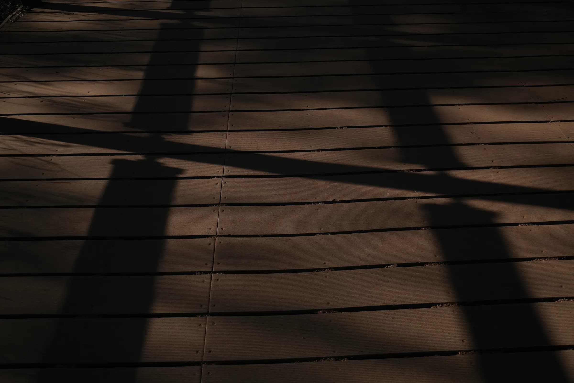 Shadows on a wooden deck